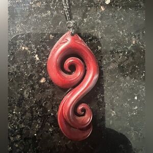 Māori-style Koru Red Swirl Pendant Necklace